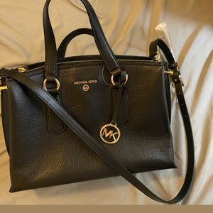 MK pocketbook with MK coin  comes with dust cover